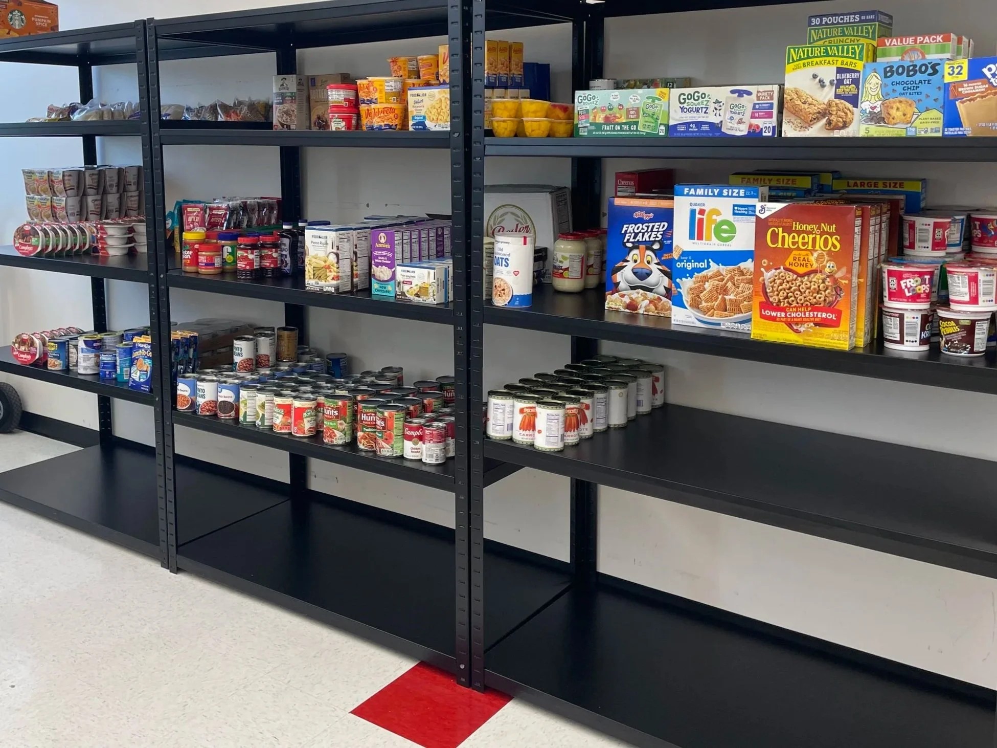 Food pantry shelves stocked with supplies
